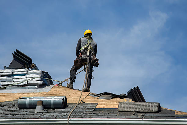 Professional Roofing technician working in Port Jefferson Station, NY